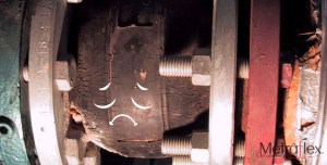 This photo illustrates a hard-boiled expansion joint. Rubber turns hard and brittle when exposed to temperatures exceeding the published limits. It won’t be immediate, but over time the rubber will essentially transform into something resembling plastic. And it will no longer move. This is bad.
